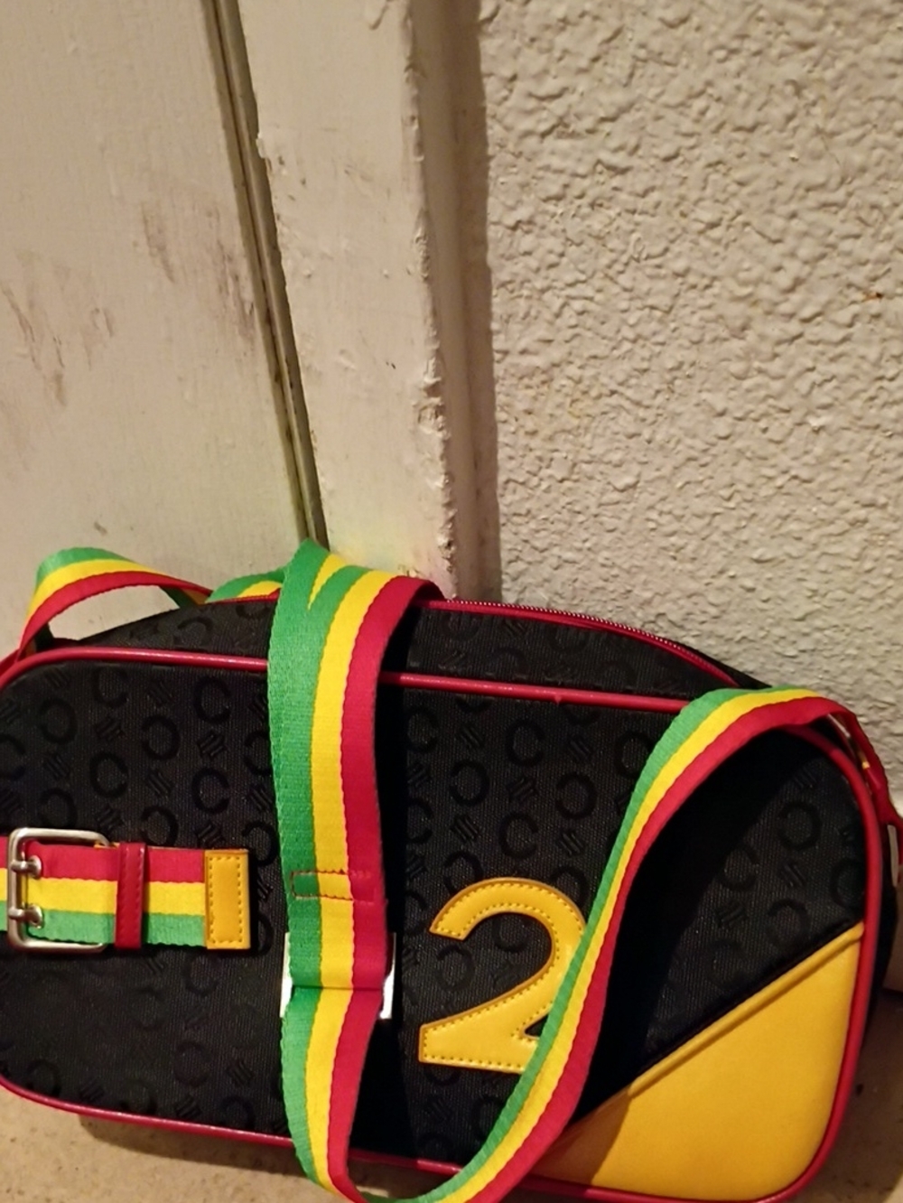 Black and Yellow Crossbody Bag with Rasta Strap